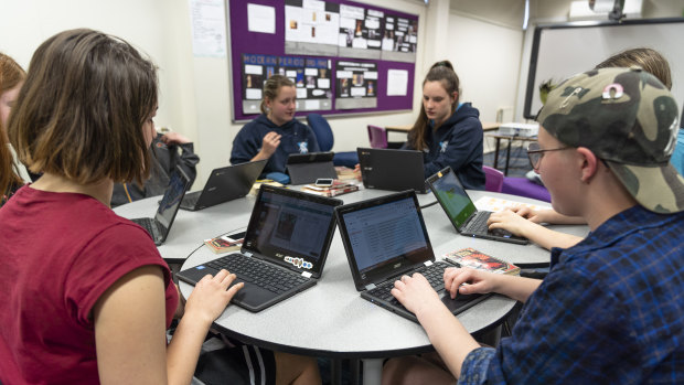 Alfred Deakin High School students Jessica Booth (left) Catriona Cochrane, Catherine Smith and Sabrina Allan using Chromebooks at school