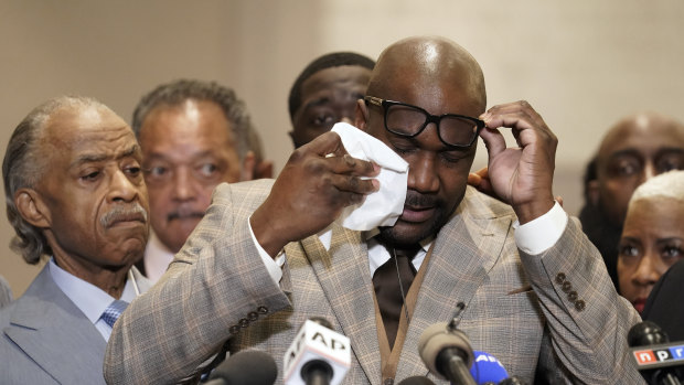 George Floyd’s brother Philonise Floyd wipes his eyes during a news conference after the verdict.