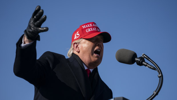 President Donald Trump speaks during a campaign rally in Iowa.