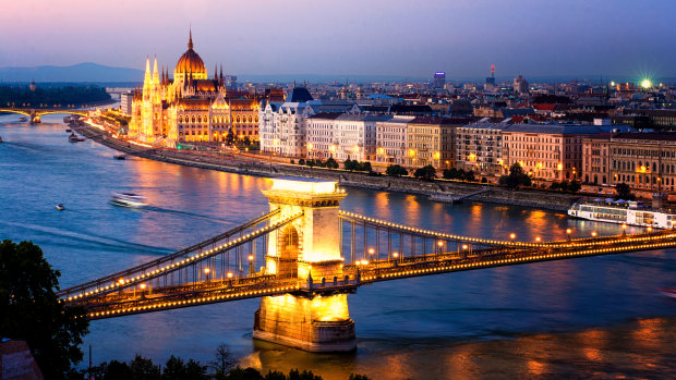 The beautiful cities of Buda and Pest, with Margaret Island in the background. 