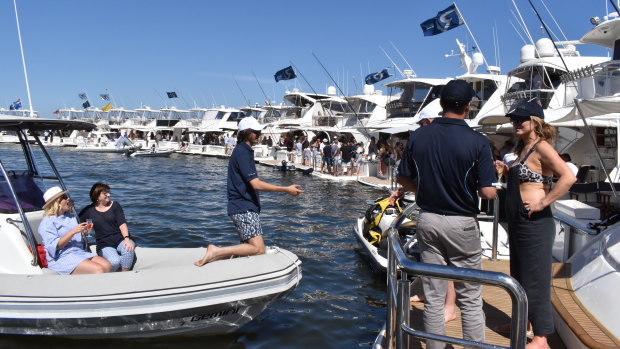 Over 43 luxury motor yacht owners and their families congregated on boats to try and break their previous world record of 48 boats rafted up. 
