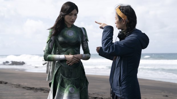Gemma Chan and director Chloé Zhao on the set of Eternals. 