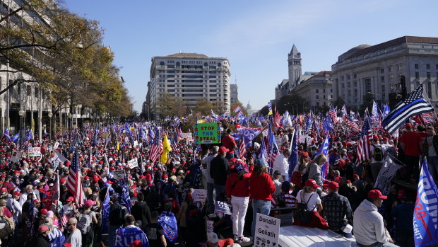 Demonstrators gather during the "Million MAGA March" at Freedom Plaza in Washington, DC.