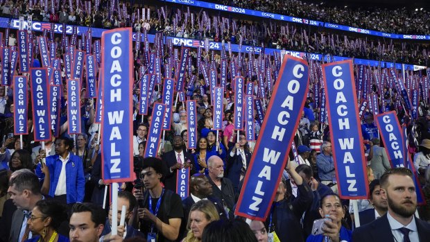 The crowd welcomes the vice presidential nominee Tim Walz.