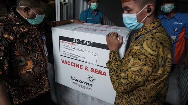Urgent: Workers unload boxes of the Sinovac coronavirus vaccine CoronaVac in Jakarta, Indonesia, last week.