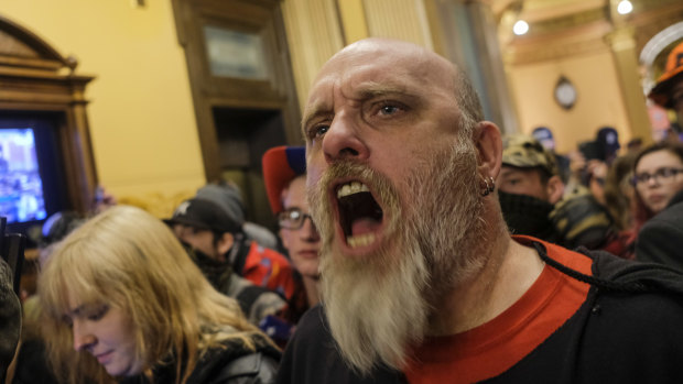 A protester shouts during the demonstration.