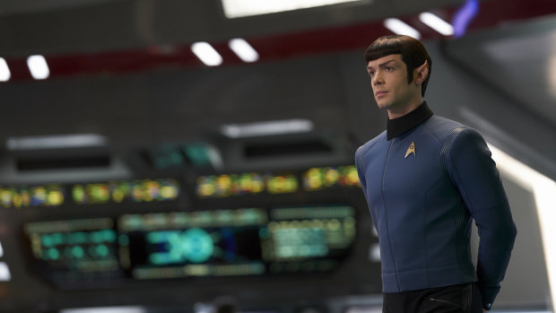 Spock wearing the blue uniform of the Enterprise science department.