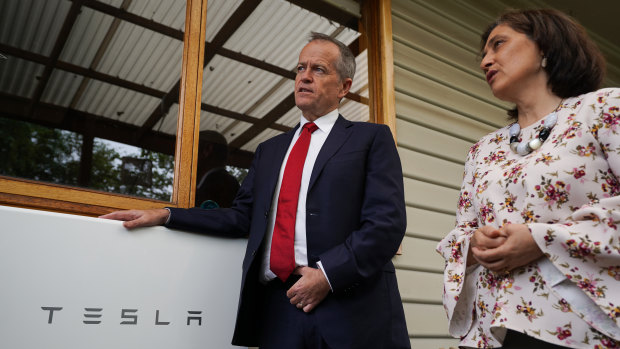 Opposition Leader Bill Shorten, with Victorian state Energy Minister Lily D'Ambrosio, out selling his energy policy in Brunswick on Friday.