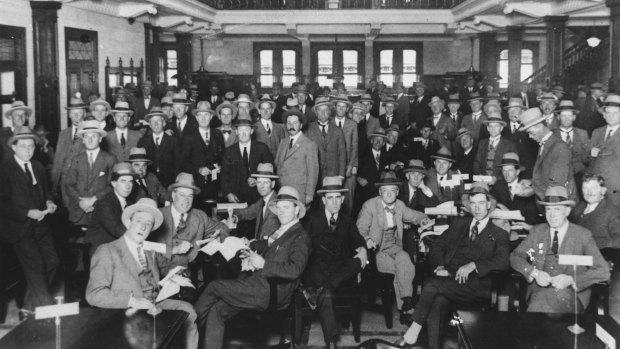 The gender of members at the Tattersall's Club has remained unchanged since its founding. Pictured is Settling day at the club for bookmakers and clients in 1926.
