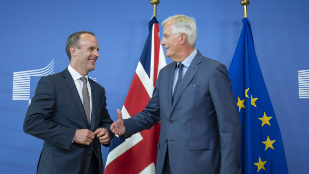 Dominic Raab, the UK Brexit secretary, left and Michel Barnier, chief negotiator for the European Union), shake hands following a news conference in Brussels, Belgium, on Friday.