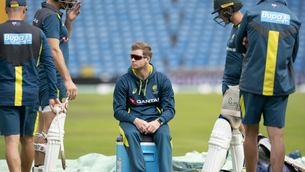 Steve Smith (centre) can only watch on as the Australian team trains at Headingley ahead of the third Test.