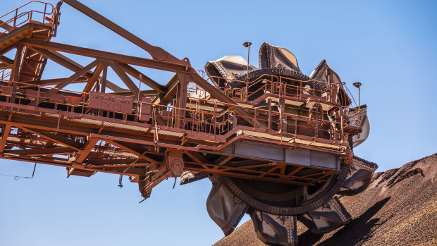 A reclaimer at the ore stockpile at the BHP Jimblebar facility in the Pilbara region of Western Australia.