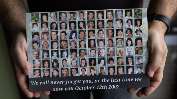 A plaque with faces of 82 of the 88 Australians who died in the 2002 Bali Bombings.
