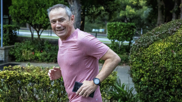 Roger Cook goes for a run early on Tuesday morning.