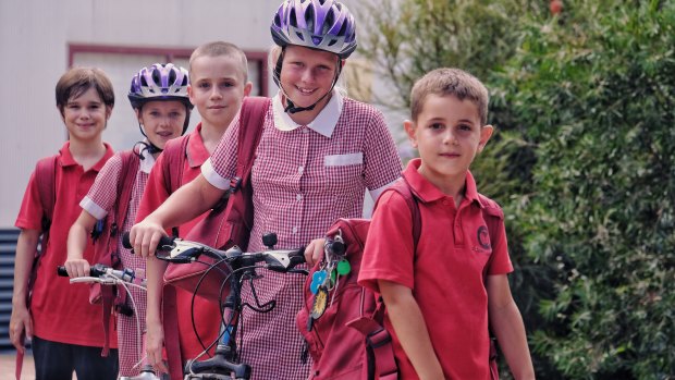 Sam, 7, Claire, 9, David, 11, Chantelle, 10 and Connor, 11, try to walk or ride to school as often as possible.