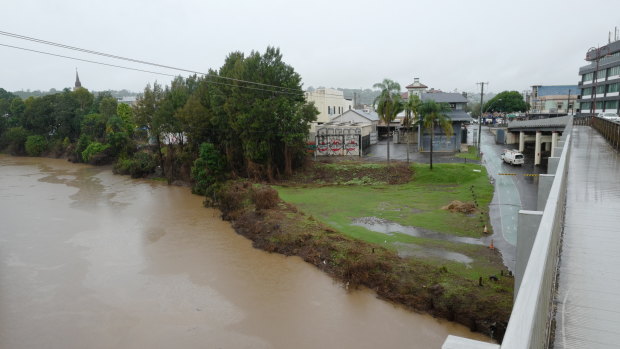 The Wilsons River flows through the centre of the main town in Lismore on Monday.