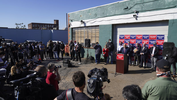 Beyond parody: The Trump administration's bizarre "Four Seasons" press conference in the car park of a landscaping company in industrial Philadelphia.