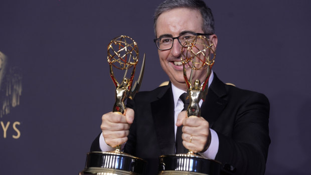 John Oliver wins outstanding writing for a variety series and outstanding variety talk series for Last Week Tonight with John Oliver.