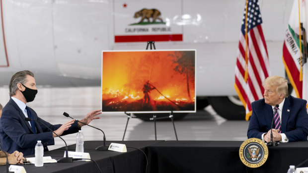 A debate about science: President Donald Trump participates in a briefing on wildfires with California Governor Gavin Newsom.