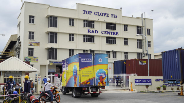 Transport truck from Top Glove enter Top Glove factory in Shah Alam, Malaysia.
