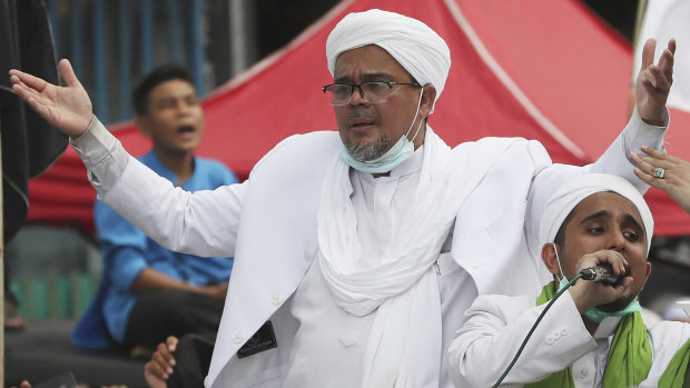 Rizieq Shihab returning from Saudi Arabia last year. 