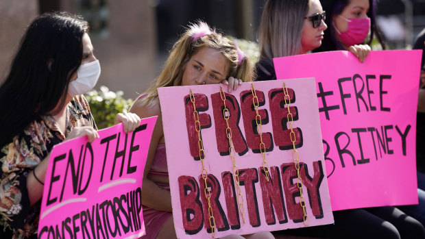 Britney Spears supporters outside a court hearing concerning the pop singer’s conservatorship in Los Angeles in February. 