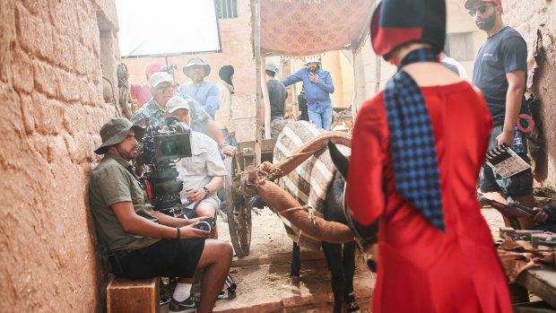 Davis and the crew on the streets of Morocco's Ouarzazate, where part of Miss Fisher and the Crypt of Tears was filmed. 