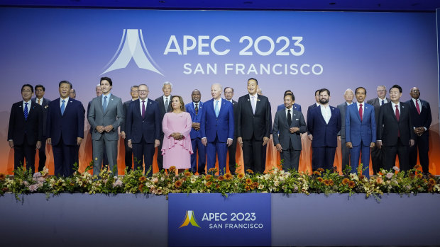 Leaders pose for a “family photo” at the the annual Asia-Pacific Economic Cooperation summit.