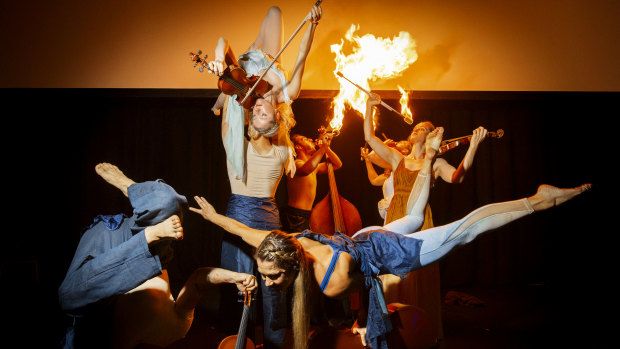 Members of the Freestyle Orchestra have a red-hot go.