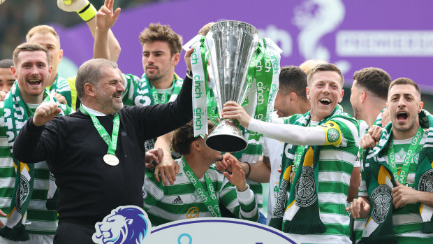 Ange Postecoglou lifts the trophy with Celtic last season.