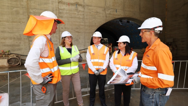 Cross River Rail chief executive (right) Graeme Newton briefs Transport Minister Mark Bailey, federal Infrastructure Minister Catherine King, Acting Premier Steven Miles and local MP Grace Grace at Cross River Rail’s Roma Street Station.