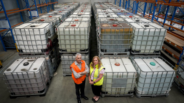 David Barry Logistics operations director Stephen Campbell and CEO Sonya Constantine in front of toxic waste sent to their storage facility by Bradbury Industrial Services in January 2020.
