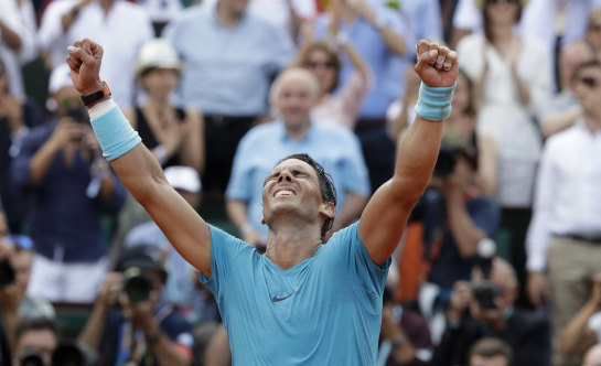 Rafael Nadal celebrates his 11th French Open win on Sunday.