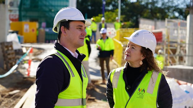 Housing Minister Sam O’Connor and Brisbane Housing Company chief Rebecca Oelkers at the Yeronga building site.