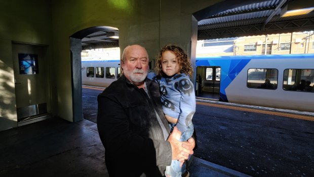 Tim Haslett and his grandson Winton, whose arm was caught in a train door.
