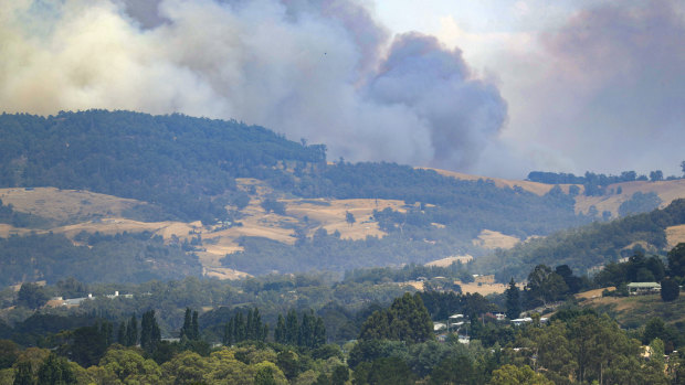 Smoke billows from a wildfire south of Huonville in southern Tasmania on Tuesday.