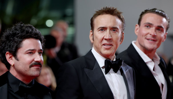 Lorcan Finnegan (left), Nicolas Cage and actor Alexander Bertrand at The Surfer world premiere in Cannes.