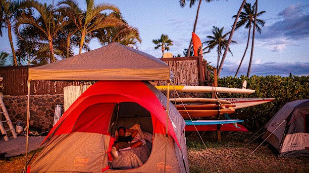 Frank Puglisi in a tent while camping in Paul Romero’s backyard in Kihei, Hawaii. Puglisi lost his boat, which he lived aboard, in Lahaina to the wildfire.