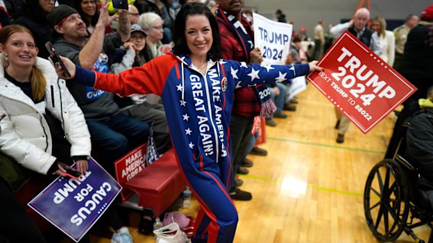 A supporter waits for Trump to arrive at a rally in Iowa last week.