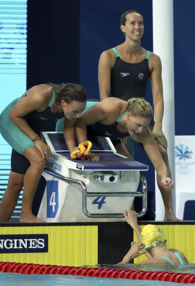 Australia's women's 4x200m freestyle relay final team celebrate after winning the gold.