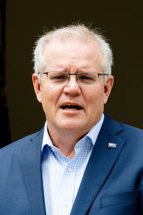 Morrison addresses the media on Sunday outside Kirribili House.