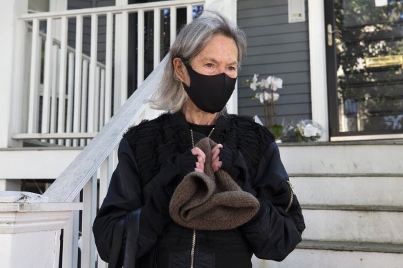 American poet Louise Gluck speaks to reporters outside her home in Cambridge, Massachusetts, after winning the Nobel Prize in literature.