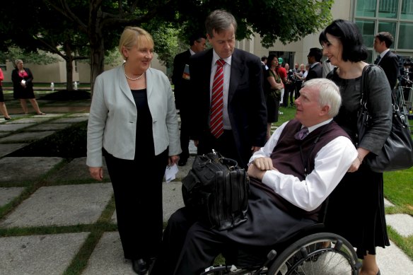John Walsh in 2011, then Associate Commissioner of the Productivity Commission, meeting with ministers in the then-Labor government, Jenny Macklin and Bill Shorten.