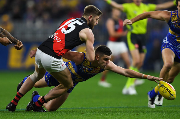 Elliot Yeo and Jayden Laverde battle for the ball.