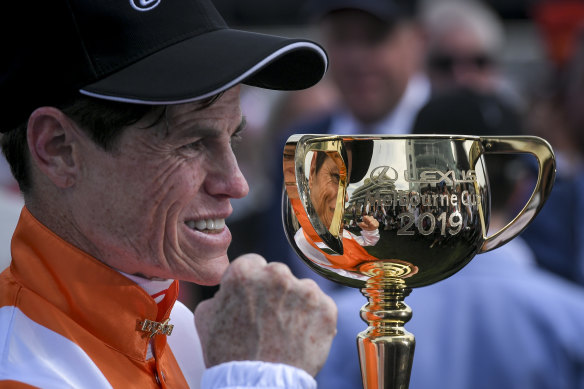 Craig Williams with the Melbourne Cup trophy. 