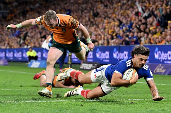 Romain Ntamack gtoes over to score as the French pile on the agony.