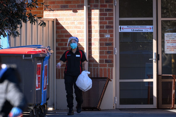 A worker at the Blue Cross Western Gardens facility in Sunshine on Monday.