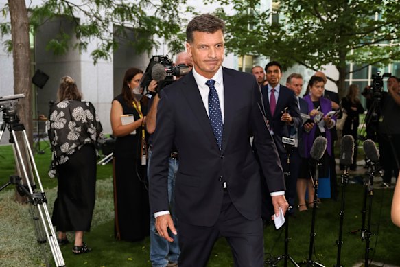 Angus Taylor leaves after making his statement.