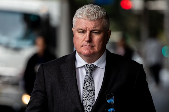 Former Australian cricketer Stuart MacGill arrives at the Sydney Downing Centre on Friday.
