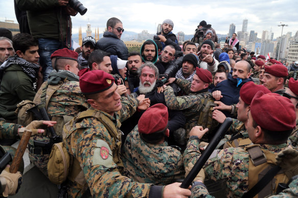 Lebanese military clash with protesters in February. 